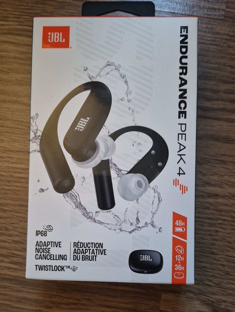 JBL Endurance Peak 4 Earbuds in Black and White